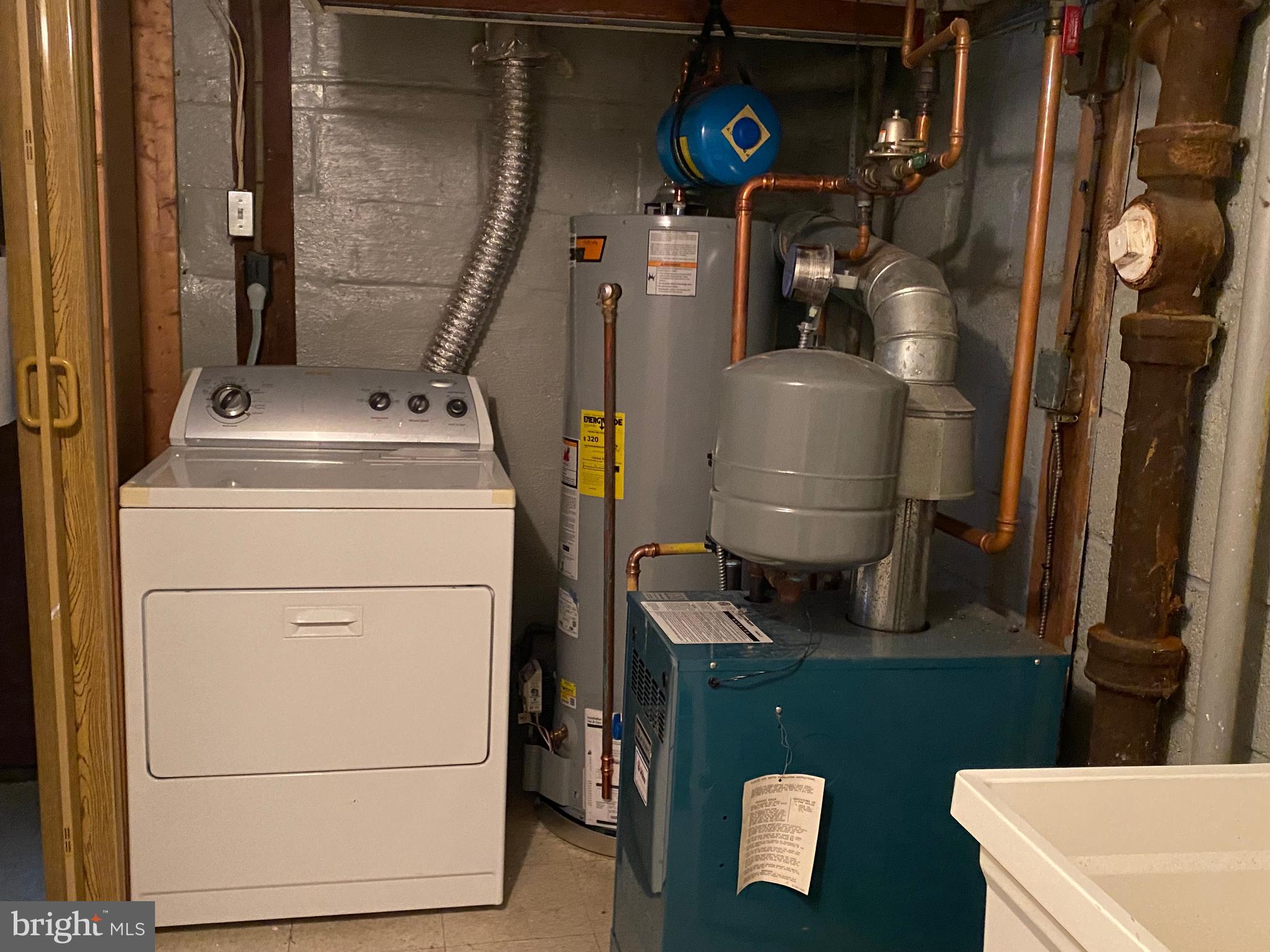 7527 8th Street Northwest Washington, DC 20012 - Photo 18 of 18 a room with water heater and utility room
