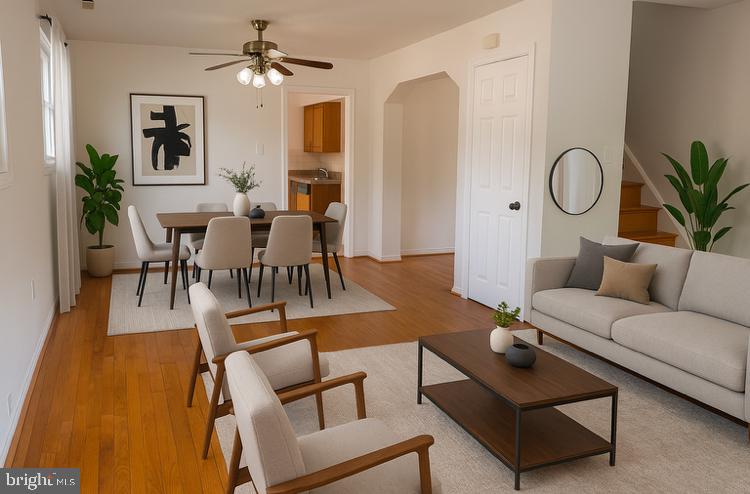 7527 8th Street Northwest Washington, DC 20012 - Photo 5 of 18 a living room with furniture a table and wooden floor