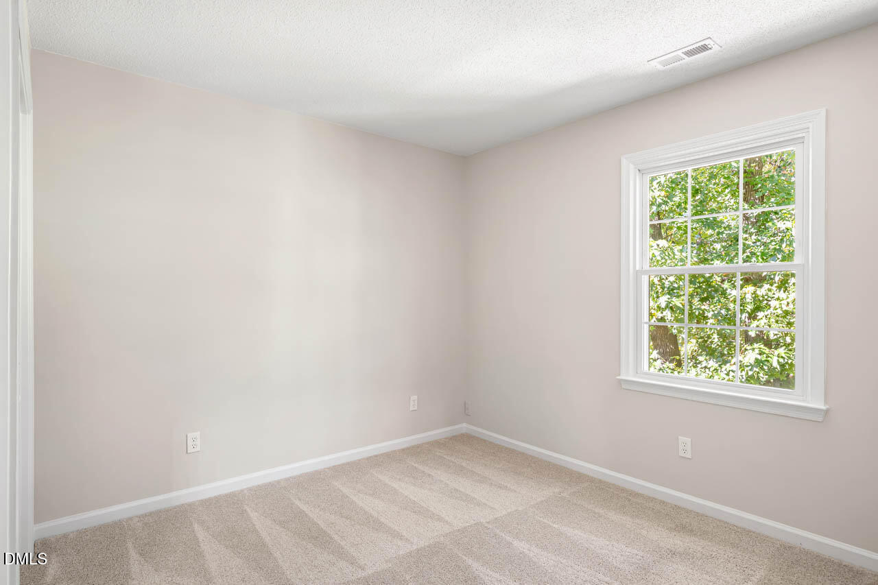 5516 Bridford Place Raleigh, NC 27613 - Photo 26 of 41 Second Upstairs Bedroom