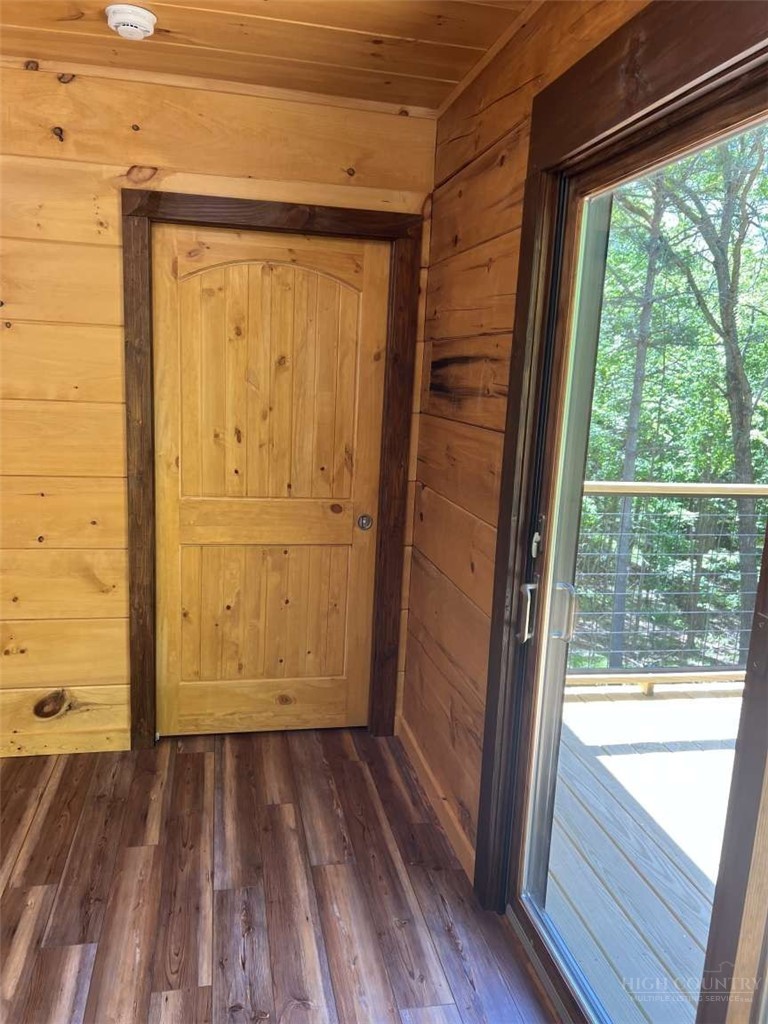 138 Talon Drive Boone, NC 28607 - Photo 11 of 25 a view of front door with wooden floor