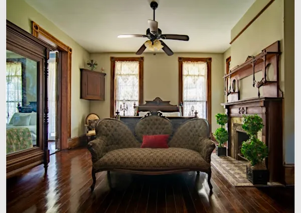 a bed room with a bed and a dresser