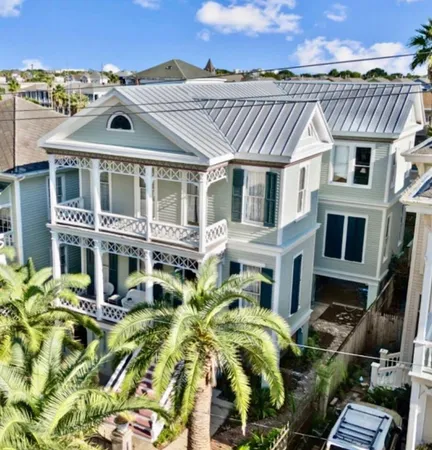a view of a living room and dining room