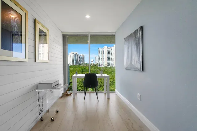 a view of livingroom with furniture and window