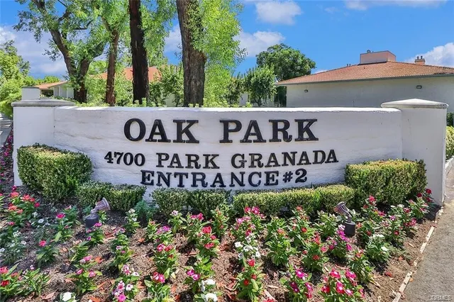 a sign on the side of the road