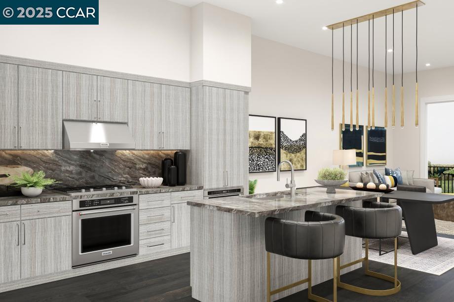 308 Torrey Pine Terrace, Unit 607 Sunnyvale, CA 94086 - Photo 3 of 15 a kitchen with a stove a sink and a microwave