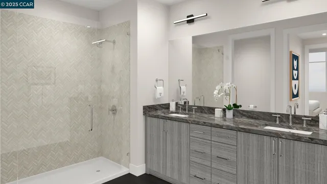 a bathroom with double sink and a mirror