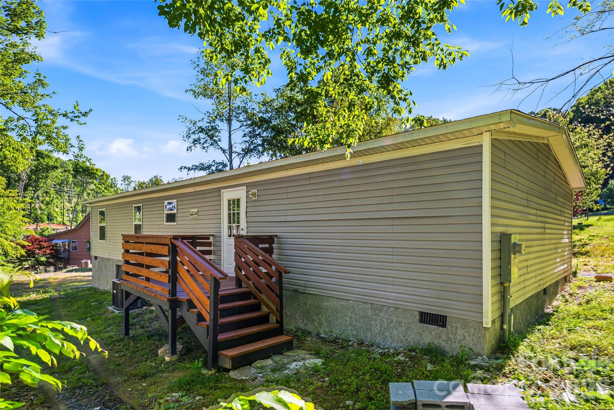45 Alan Retreat Road Hendersonville, NC 28792 - Photo 24 of 25 a front view of a house with a yard