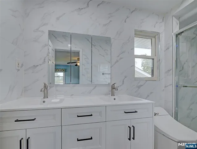 a bathroom with a sink and a toilet