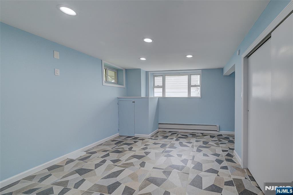 819 Ridgewood Road Millburn, NJ 07041 - Photo 33 of 39 a view of an empty room and window