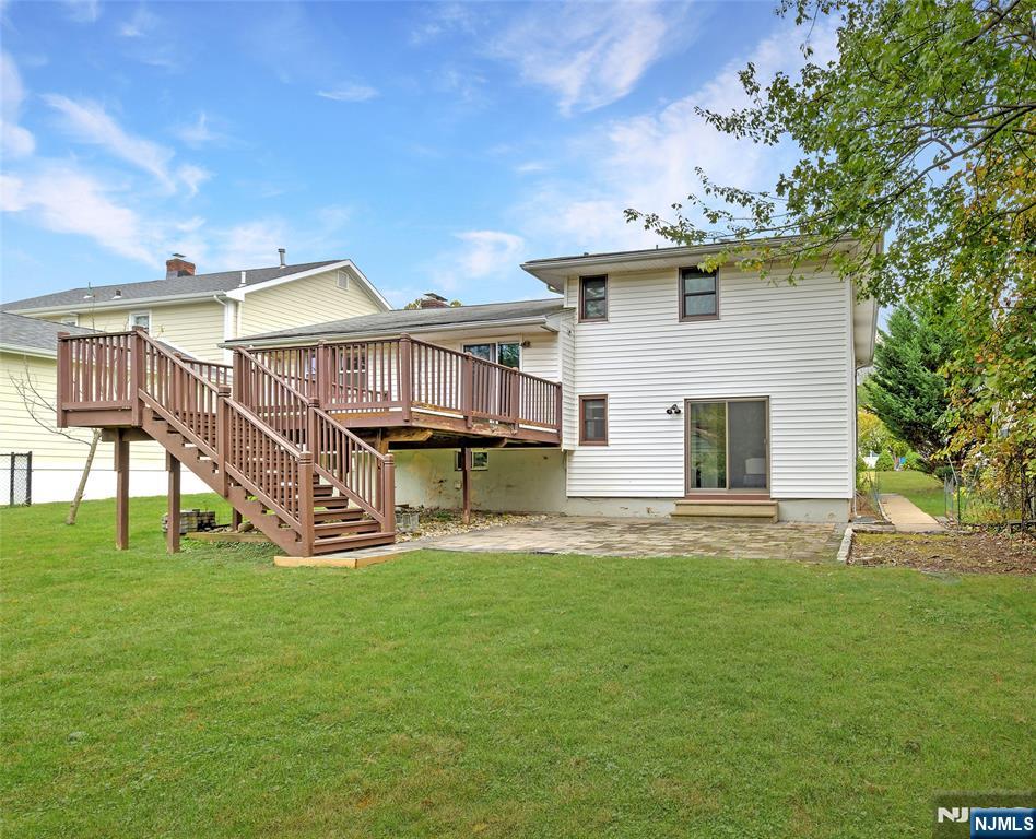 819 Ridgewood Road Millburn, NJ 07041 - Photo 37 of 39 a view of a house with a yard