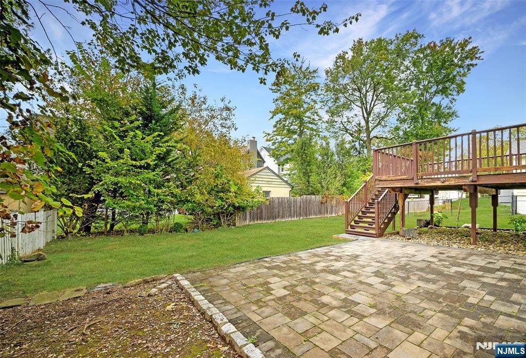 819 Ridgewood Road Millburn, NJ 07041 - Photo 38 of 39 a view of a house with a yard