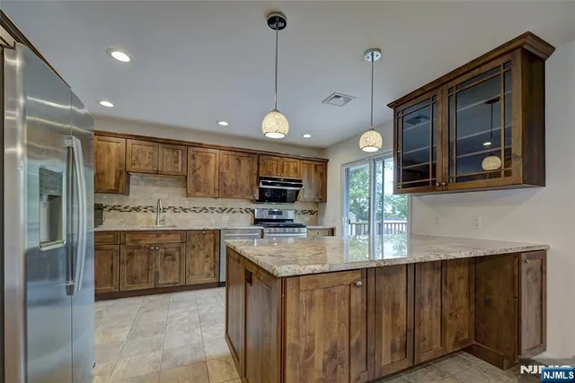 a kitchen with lots of counter space and a sink