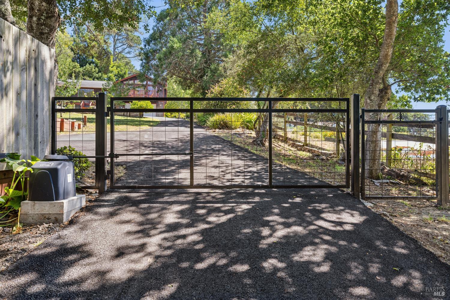 10931 Barnett Valley Road Sebastopol, CA 95472 - Photo 10 of 57 Coded entry gate...