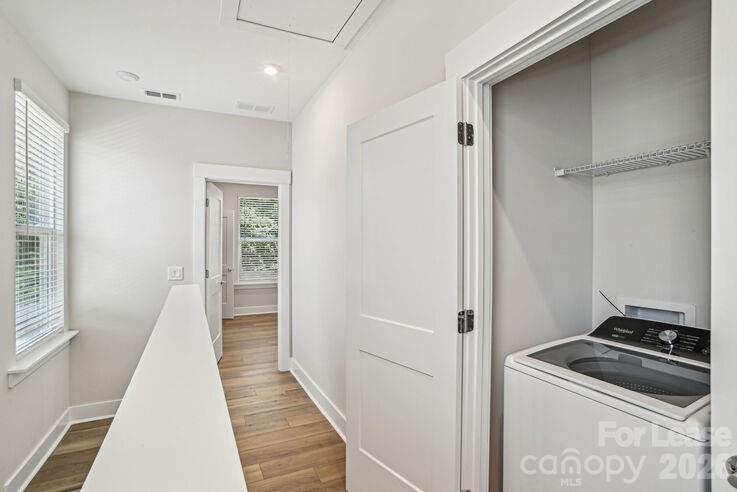 4375 Raleigh Street, Unit C1 Charlotte, NC 28213 - Photo 11 of 19 a view of a kitchen from the hallway