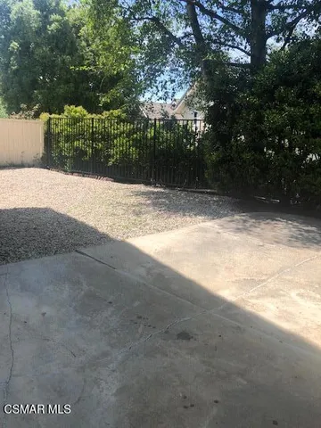 a view of backyard with green space