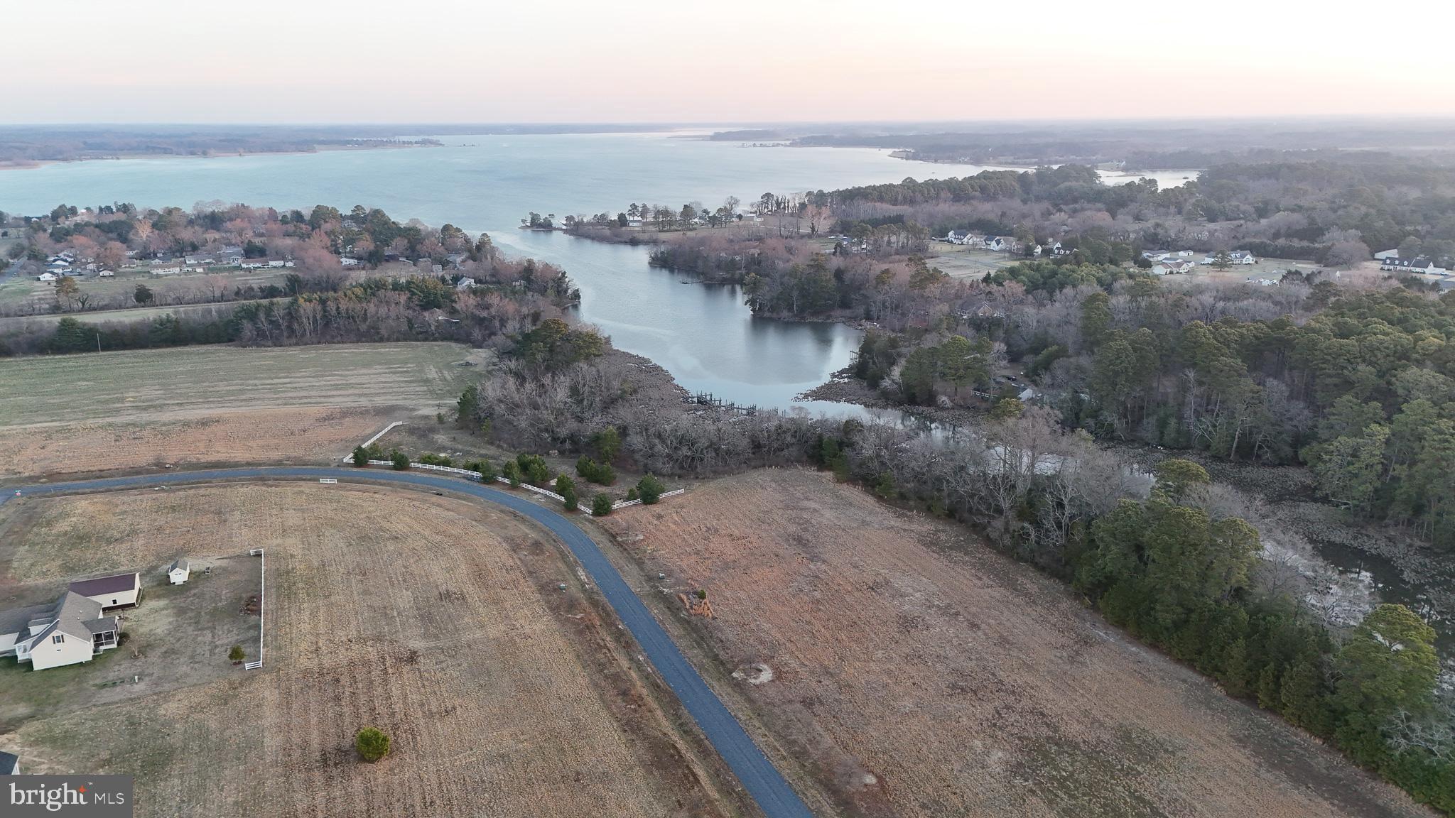 River View Road East New Market, MD 21631 - Photo 4 of 24 an aerial view of a house with a yard and ocean view