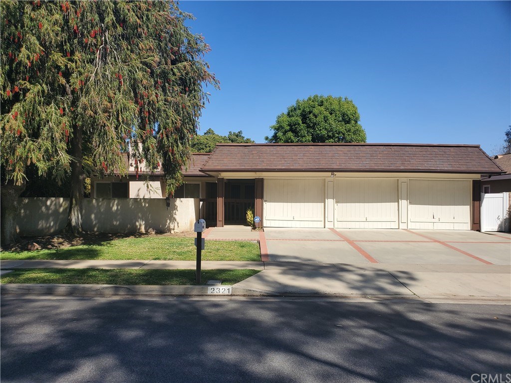 Front, gated entry, three car garage, lots of driveway parking.