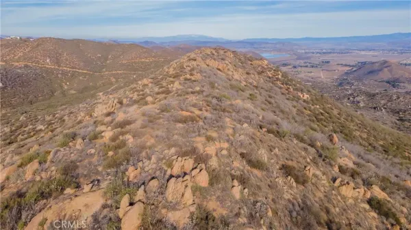 a view of mountains and valleys