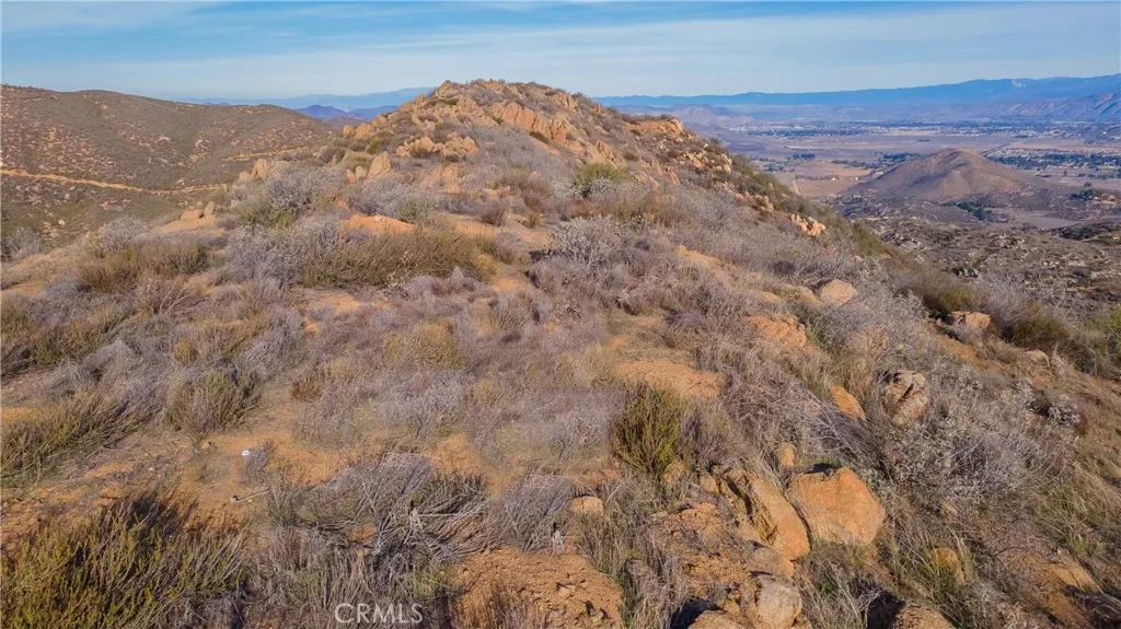 0 Lawghlin Temecula, CA 92592 - Photo 18 of 19 a view of a dry yard with mountains in the background