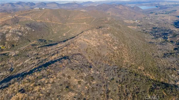 a view of a city with mountains in the background
