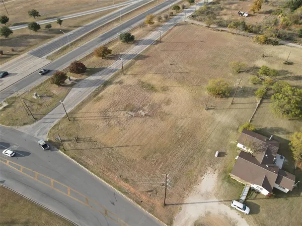 a view of balcony with wooden floor
