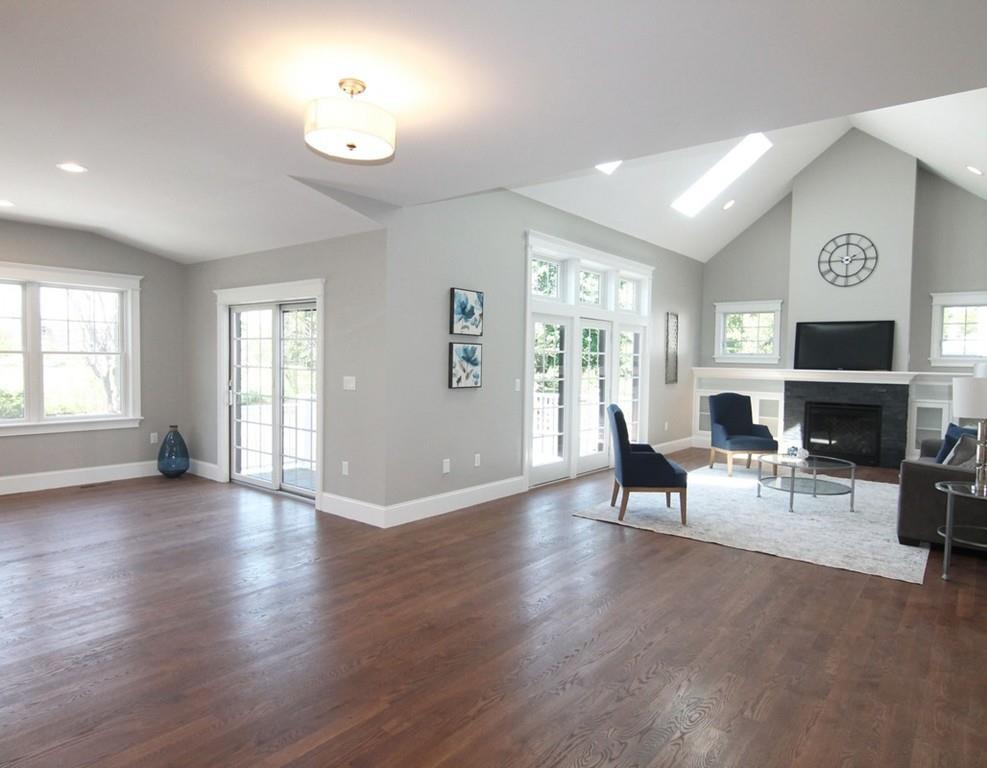 18 Hathaway Road Lexington, MA 02420 - Photo 10 of 39 a living room with furniture a fireplace and a window