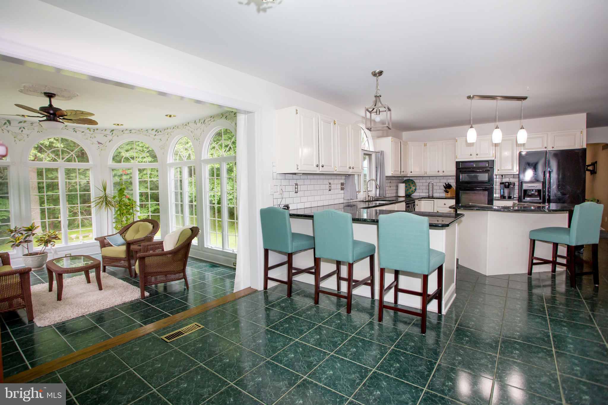 18 Raphael Road Hockessin, DE 19707 - Photo 17 of 39 Can you see the sun room?