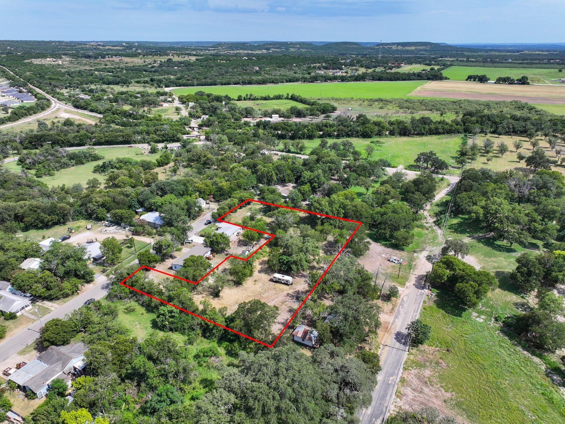 Tbd South Pierce Street Burnet, TX 78611 - Photo 11 of 19 an aerial view of residential houses with outdoor space and trees