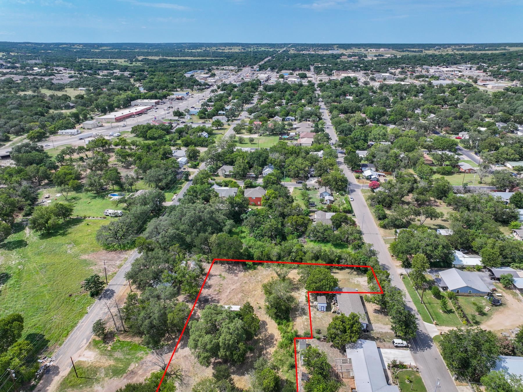 Tbd South Pierce Street Burnet, TX 78611 - Photo 15 of 19 an aerial view of residential houses with outdoor space and trees