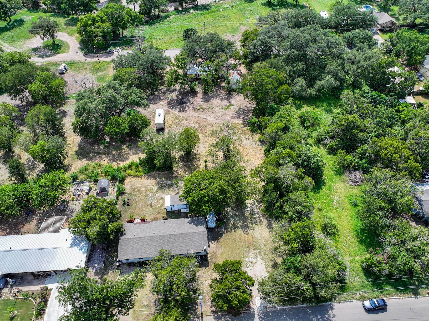 Tbd South Pierce Street Burnet, TX 78611 - Photo 19 of 19 an aerial view of residential house with outdoor space and trees all around