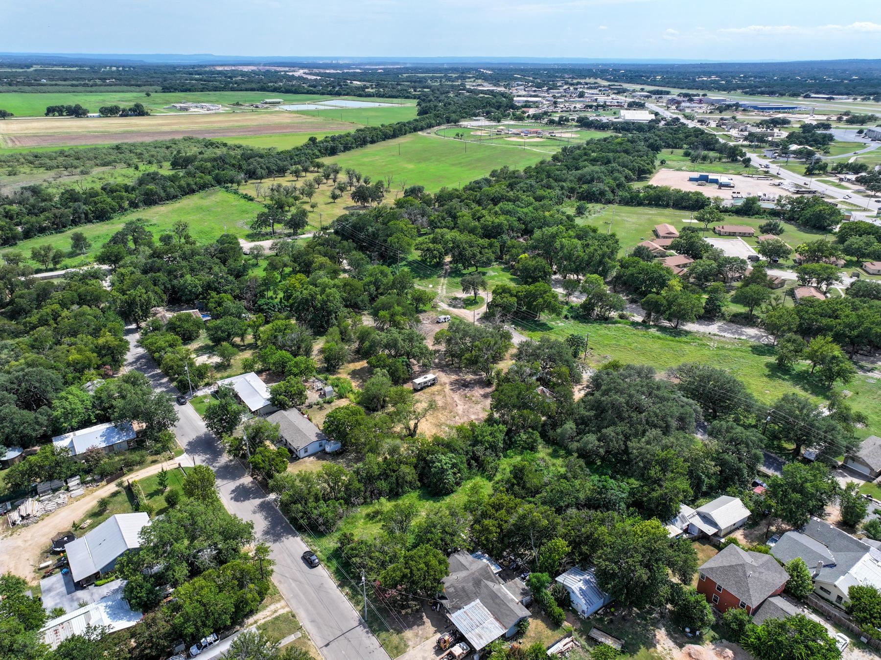 Tbd South Pierce Street Burnet, TX 78611 - Photo 10 of 19 an aerial view of a houses with a yard and lake view