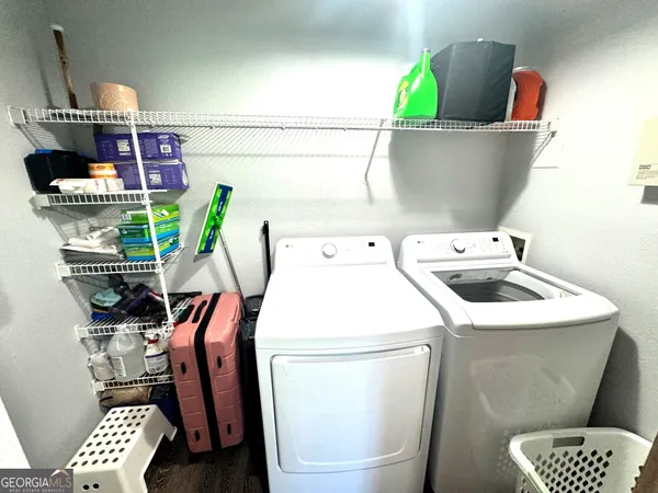 a utility room with dryer and washer