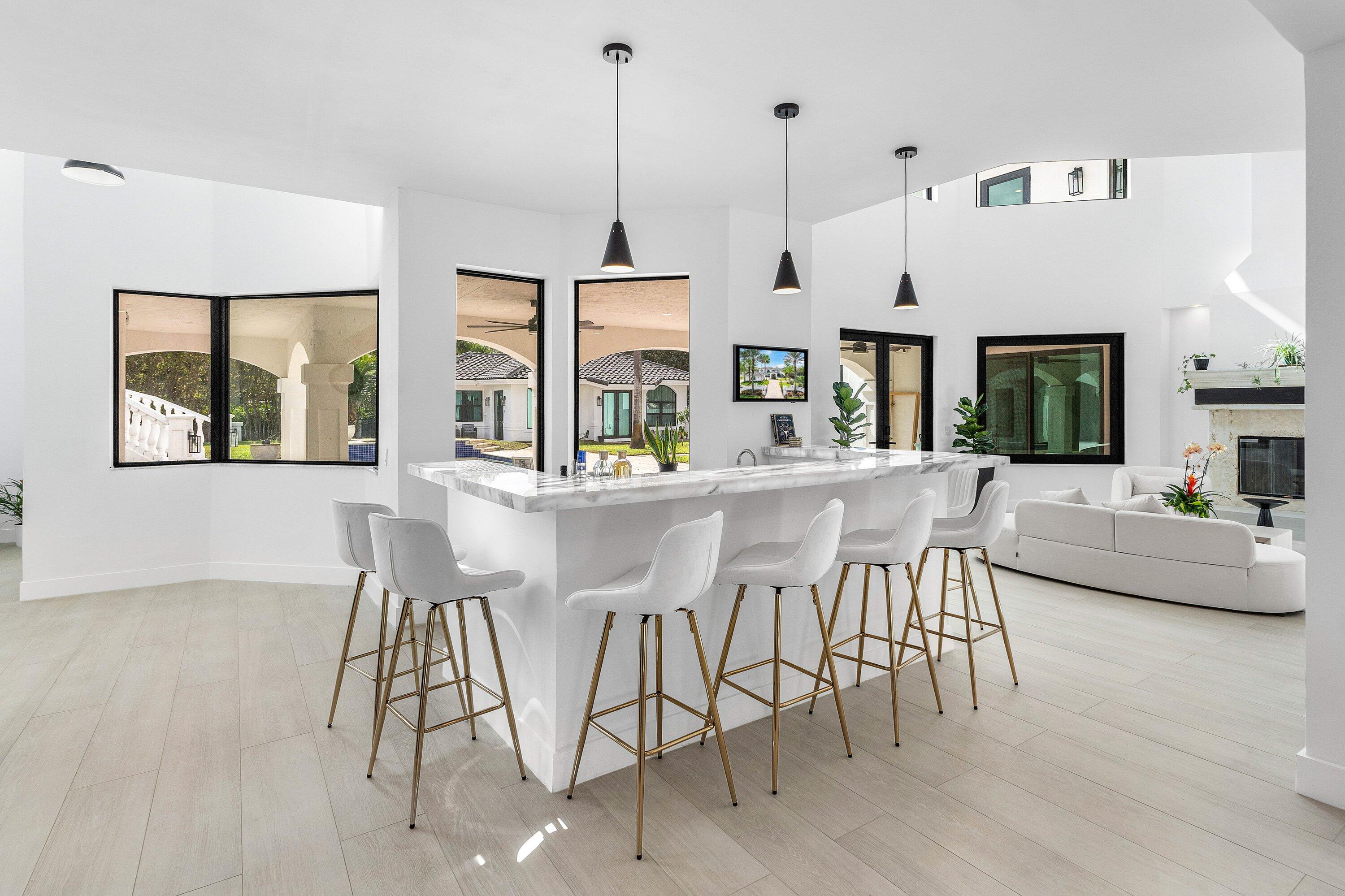 17600 Fieldbrook Circle East Boca Raton, FL 33496 - Photo 14 of 91 a view of a dining room with furniture window and wooden floor