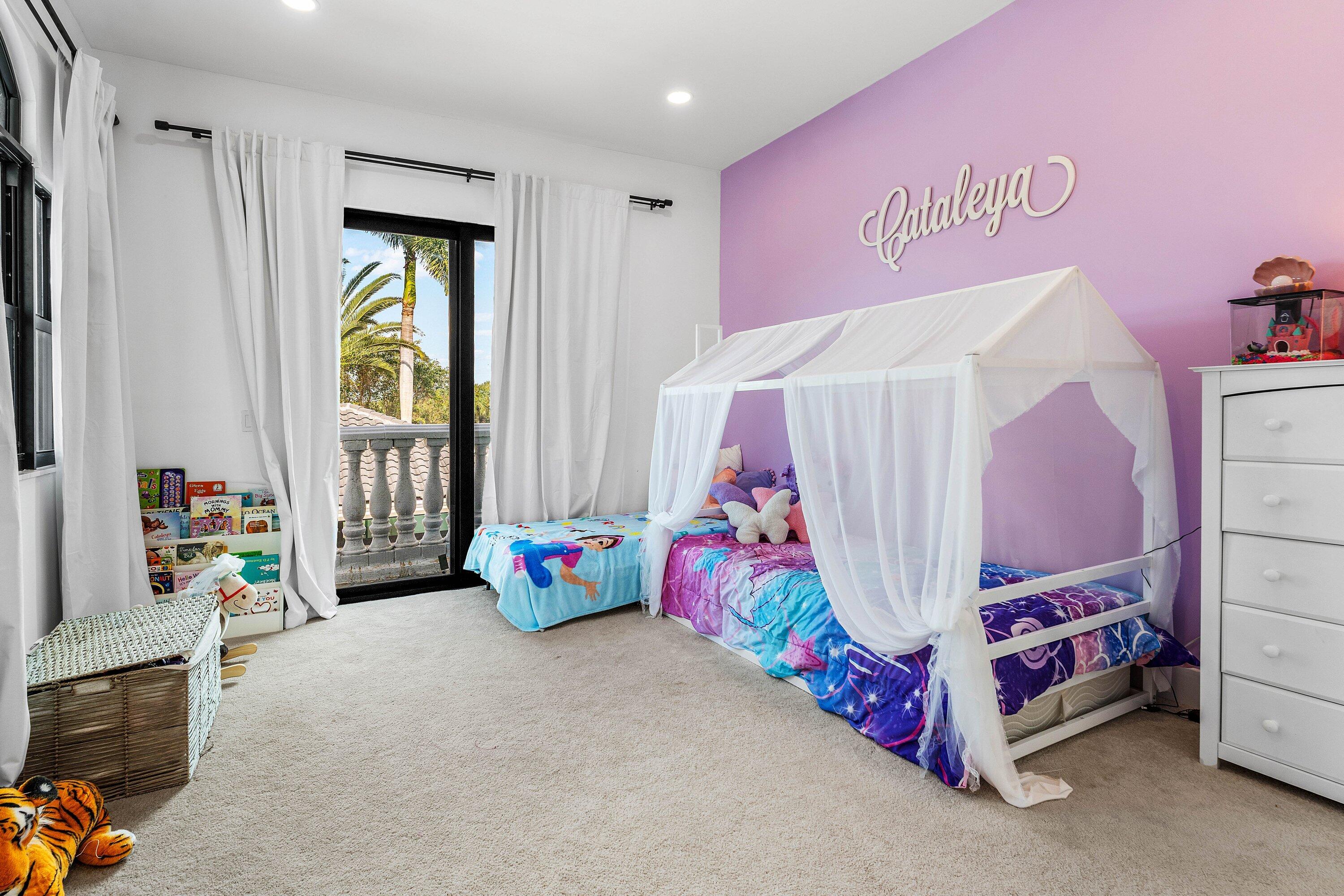 17600 Fieldbrook Circle East Boca Raton, FL 33496 - Photo 48 of 91 a bedroom with a bed and a window