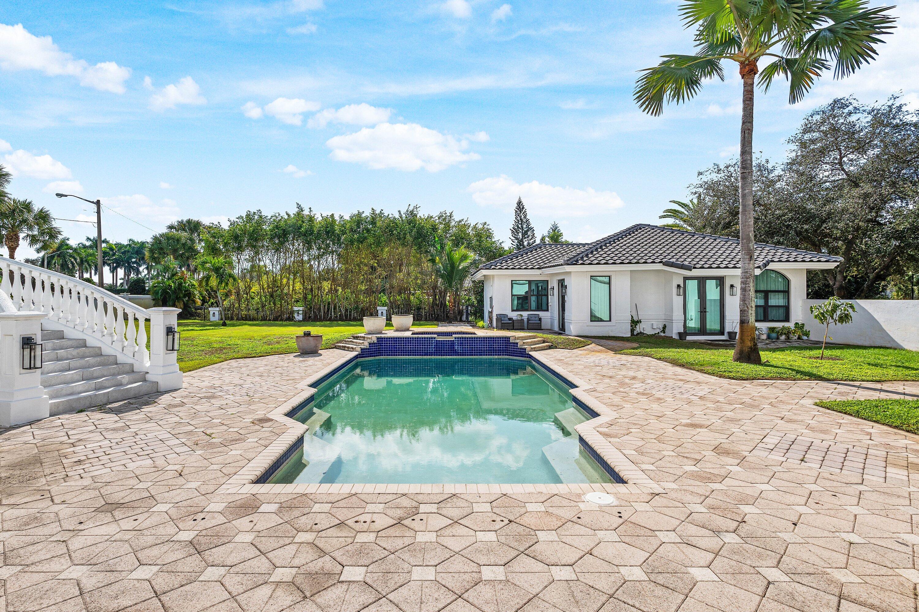 17600 Fieldbrook Circle East Boca Raton, FL 33496 - Photo 60 of 91 a view of outdoor space yard and swimming pool