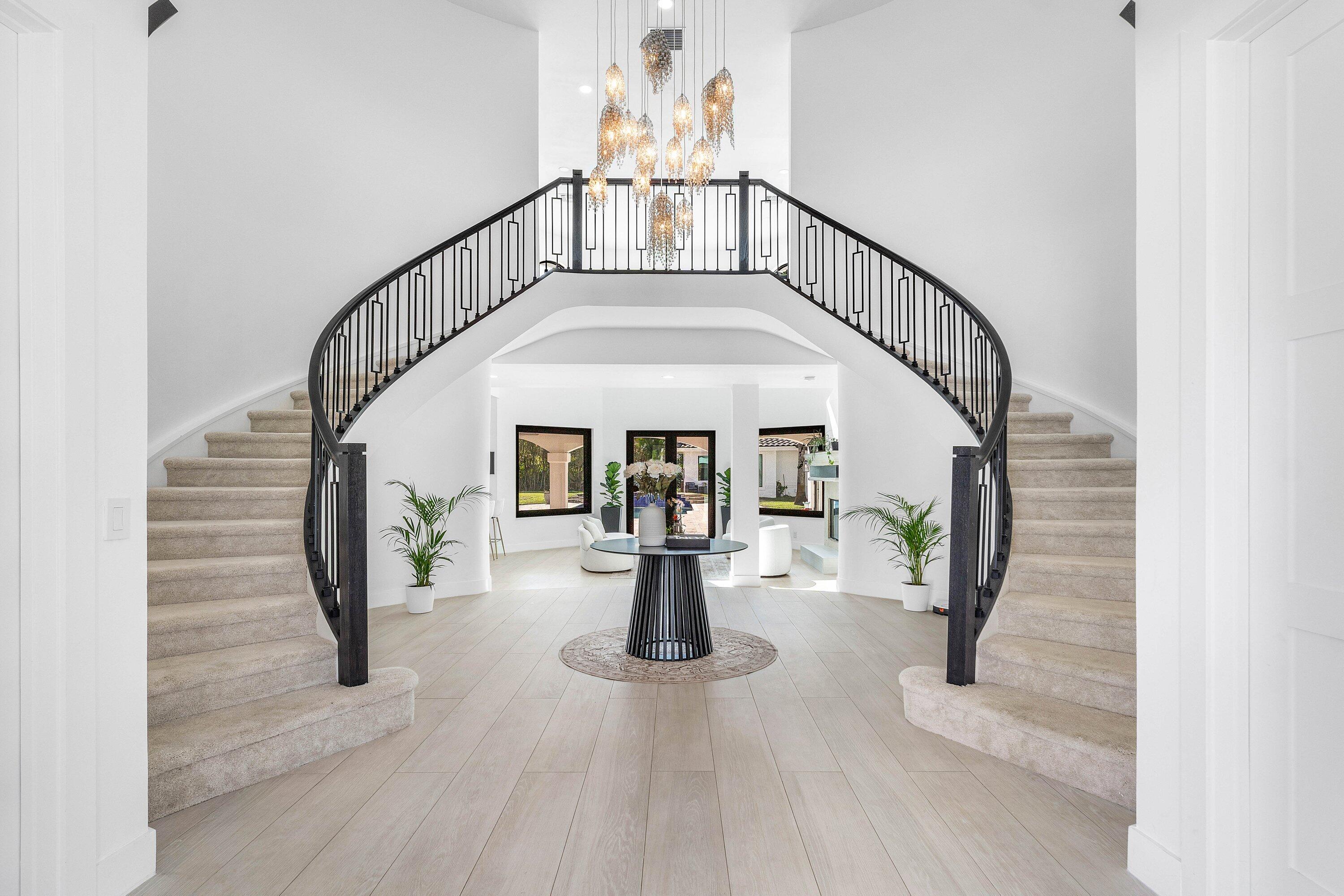 17600 Fieldbrook Circle East Boca Raton, FL 33496 - Photo 10 of 91 a view of entryway and hall with wooden floor