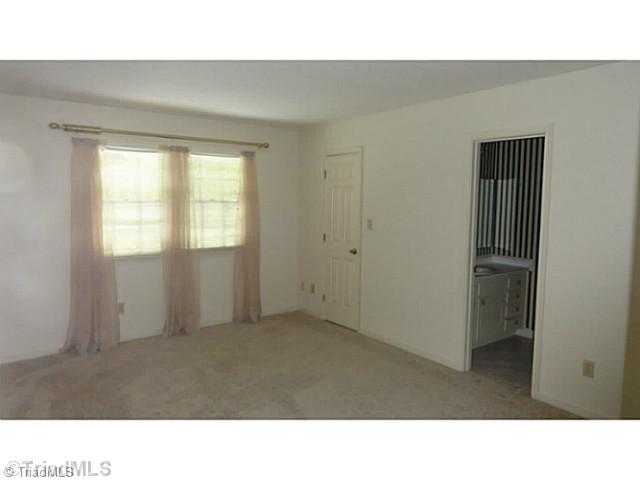 4931 Tower Road, Unit A Greensboro, NC 27410 - Photo 7 of 13 Master Bedroom.