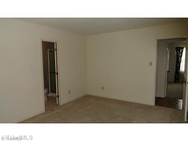 4931 Tower Road, Unit A Greensboro, NC 27410 - Photo 8 of 13 Master Bedroom.