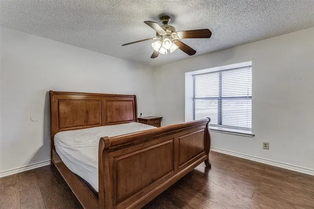 a dining room with furniture and a rug