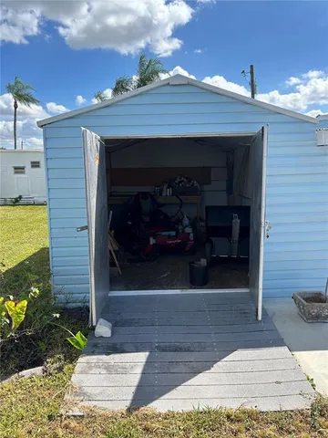 a view of a house with a garden