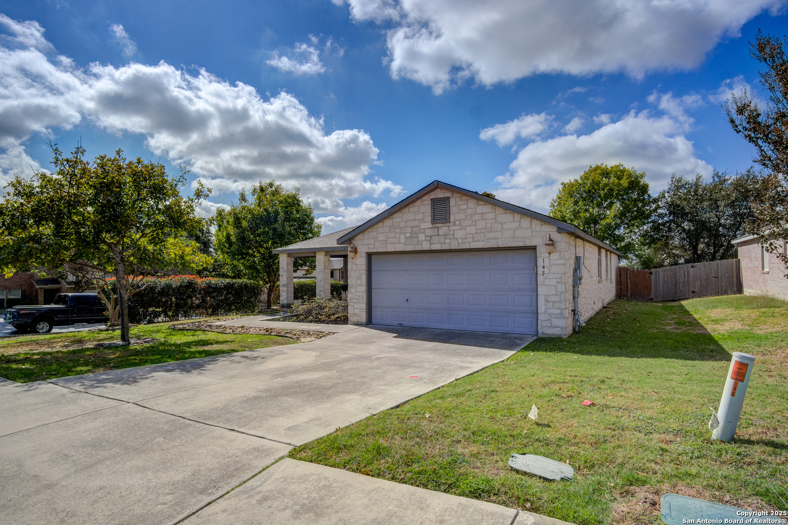 145 Stream Crossing Cibolo, TX 78108 - Photo 12 of 40 a front view of a house with garden