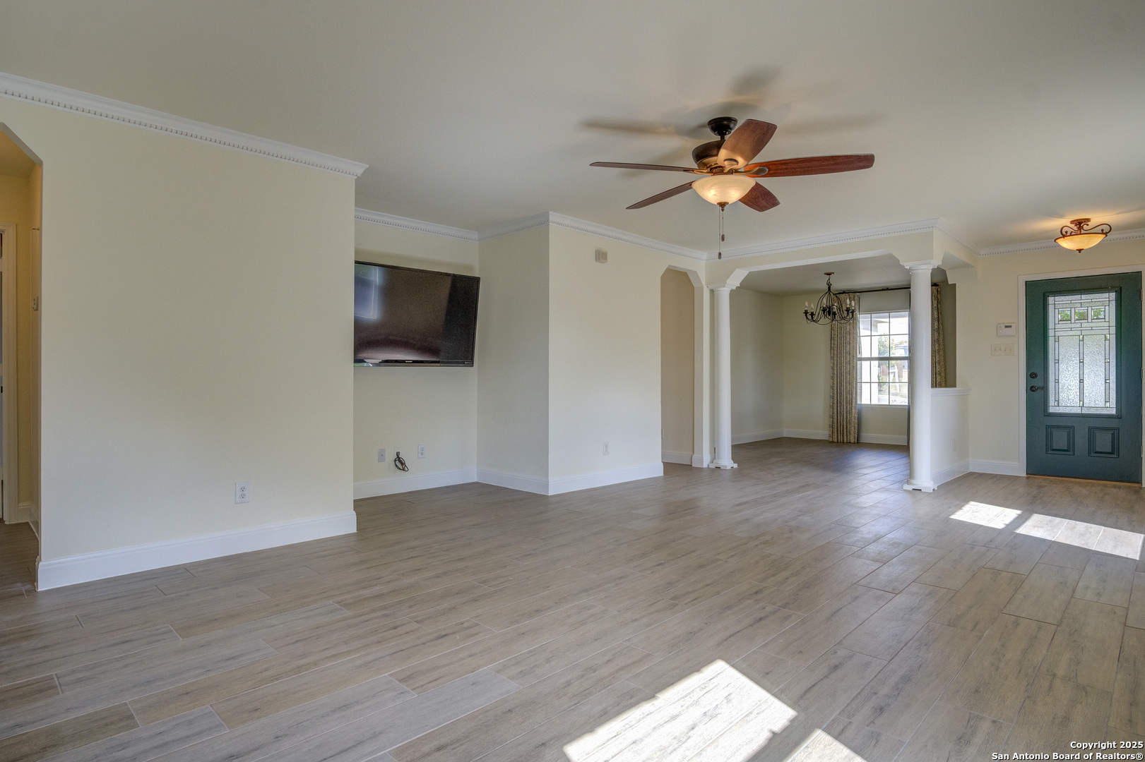 145 Stream Crossing Cibolo, TX 78108 - Photo 15 of 40 wooden floor in an empty room with a window