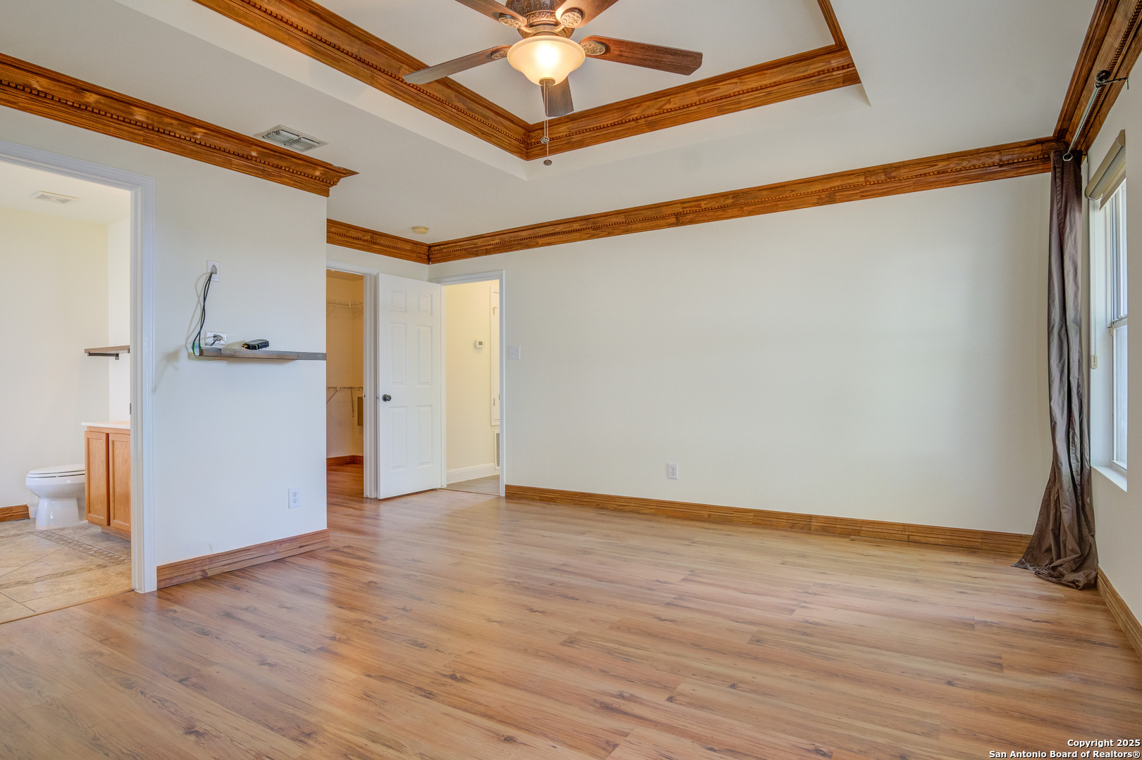 145 Stream Crossing Cibolo, TX 78108 - Photo 26 of 40 a view of a hallway with wooden floor