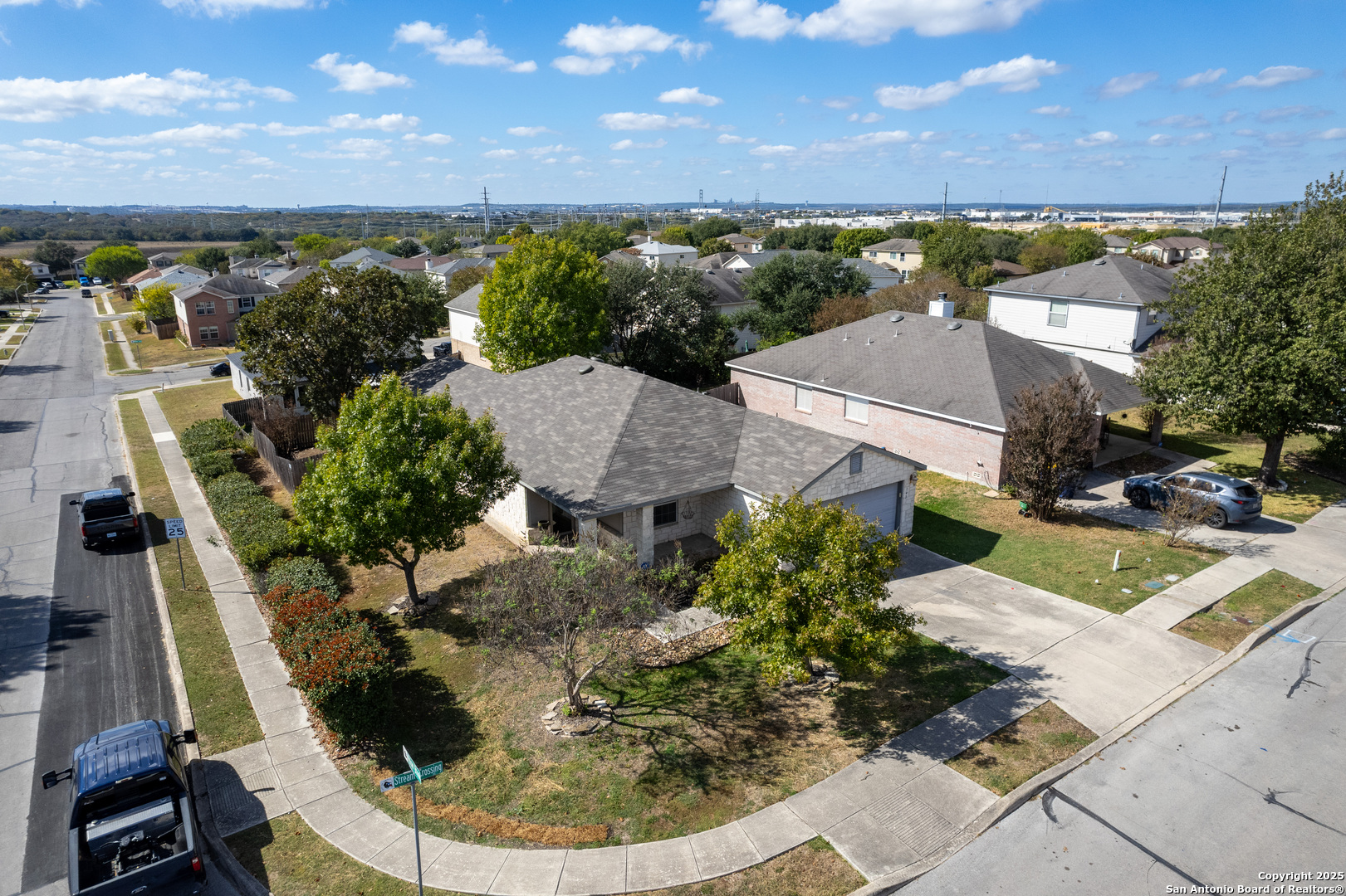 145 Stream Crossing Cibolo, TX 78108 - Photo 3 of 40 an aerial view of a house with a yard