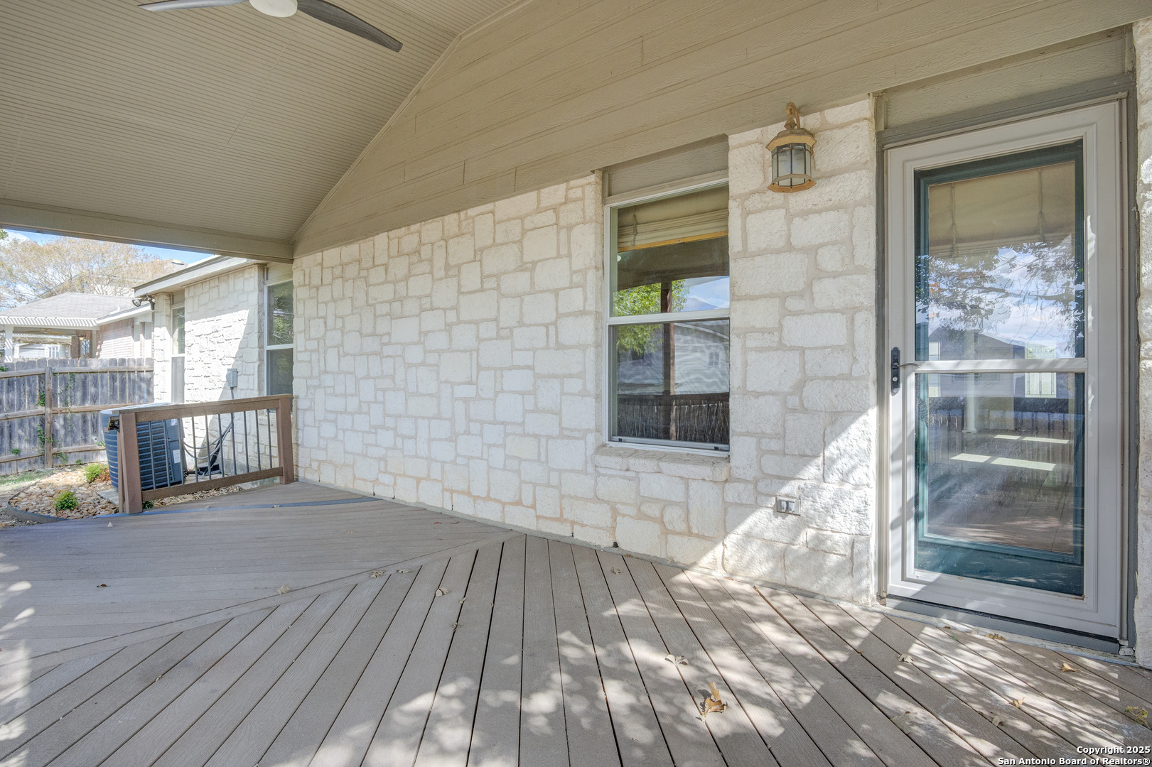 145 Stream Crossing Cibolo, TX 78108 - Photo 34 of 40 a view of empty room with wooden floor and fan