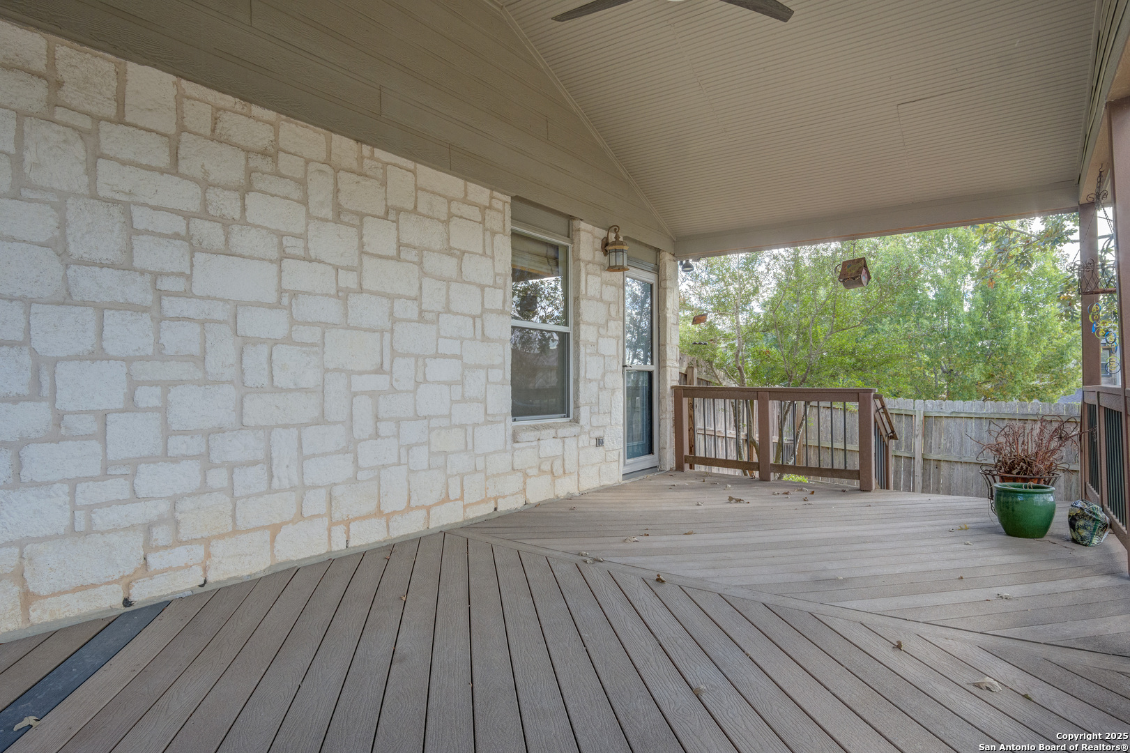 145 Stream Crossing Cibolo, TX 78108 - Photo 35 of 40 a view of an empty room with wooden floor and a window