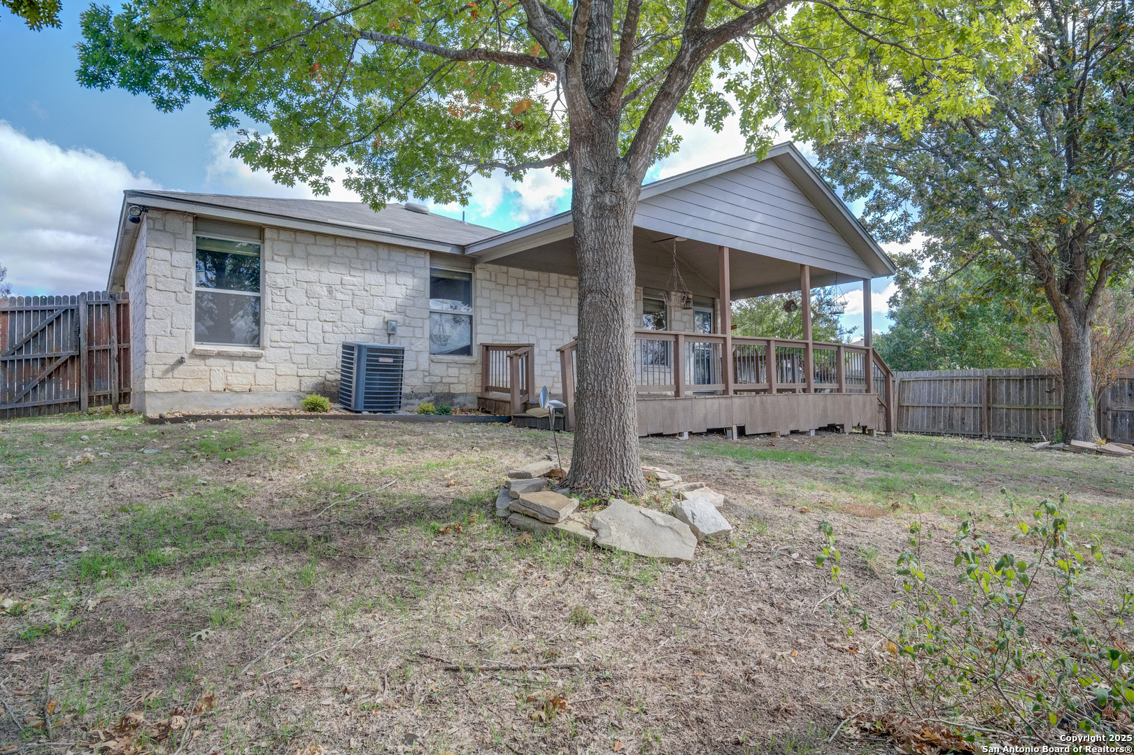 145 Stream Crossing Cibolo, TX 78108 - Photo 38 of 40 a backyard of a house with barbeque oven