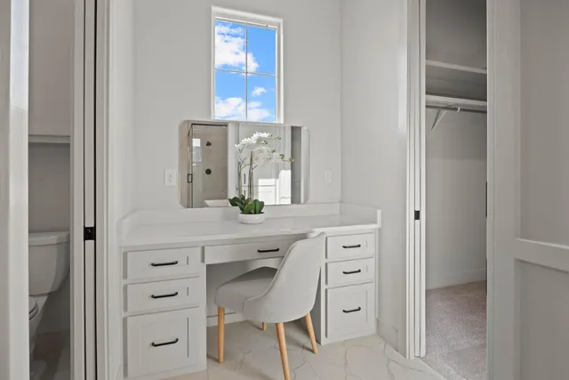 a bathroom with a granite countertop sink a mirror and a