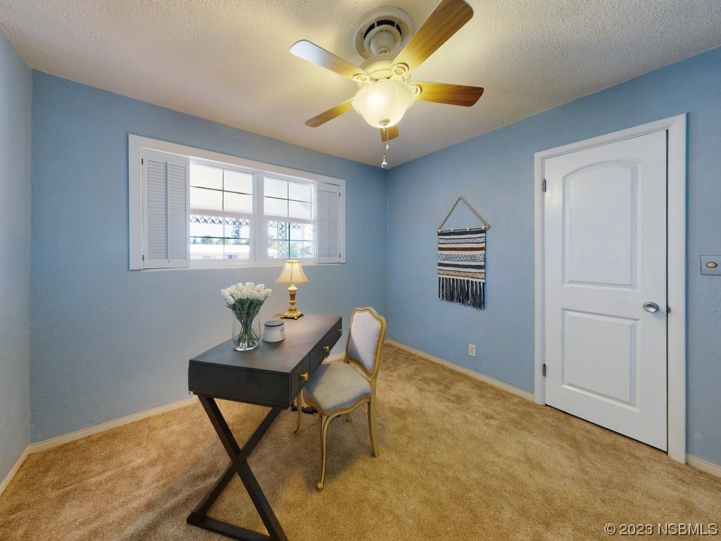 18 Silk Oaks Drive Ormond Beach, FL 32176 - Photo 32 of 46 a workspace with furniture and window