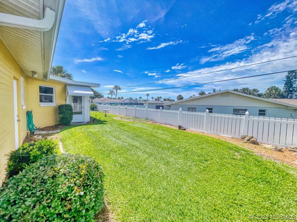 18 Silk Oaks Drive Ormond Beach, FL 32176 - Photo 39 of 46 a view of a backyard with a house